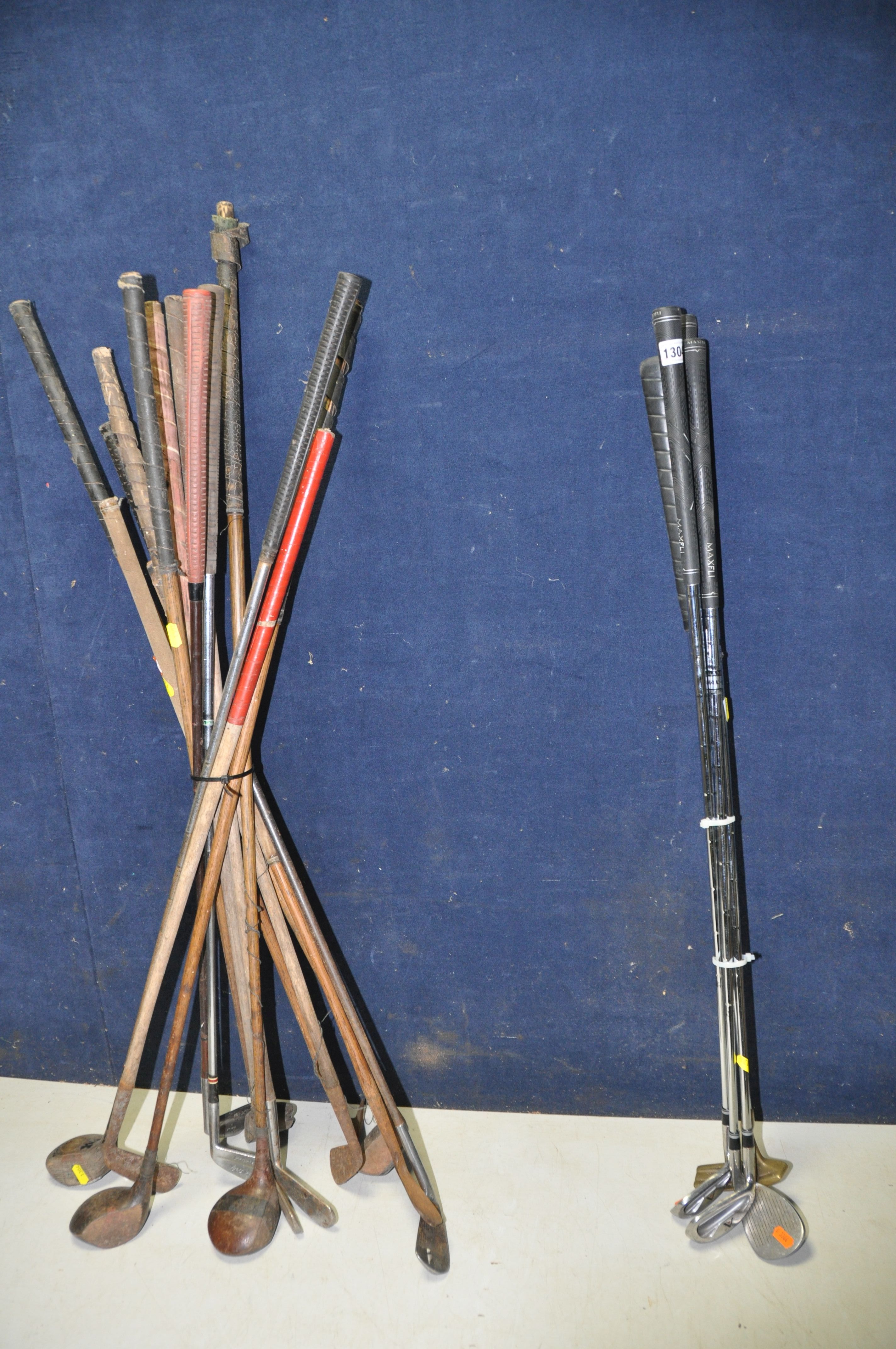 A COLLECTION OF VINTAGE AND HICKORY SHAFTED GOLF CLUBS fourteen vintage golf clubs along with four