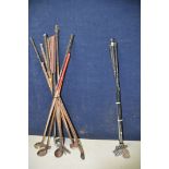 A COLLECTION OF VINTAGE AND HICKORY SHAFTED GOLF CLUBS fourteen vintage golf clubs along with four