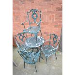 A GREEN PAINTED ALUMINIUM GARDEN TABLE, diameter 60cm x height 69cm and four armchairs (condition:-