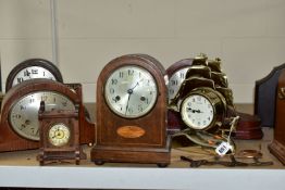 A QUANTITY OF CLOCKS AND TWO BAROMETERS, comprising two dome shaped clocks with Marquetry, height of