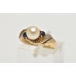 A 9CT GOLD CULTURED PEARL AND SAPPHIRE DRESS RING, the cultured pearl, with asymmetric set