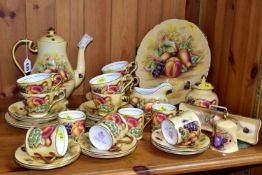 AN AYNSLEY 'ORCHARD GOLD' TEA AND COFFEE SET, comprising six teacups, six saucers, six tea plates,
