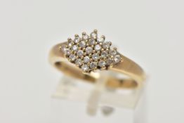 A 9CT GOLD CLUSTER RING, the cluster of a marquise design set with colourless circular cut, cubic