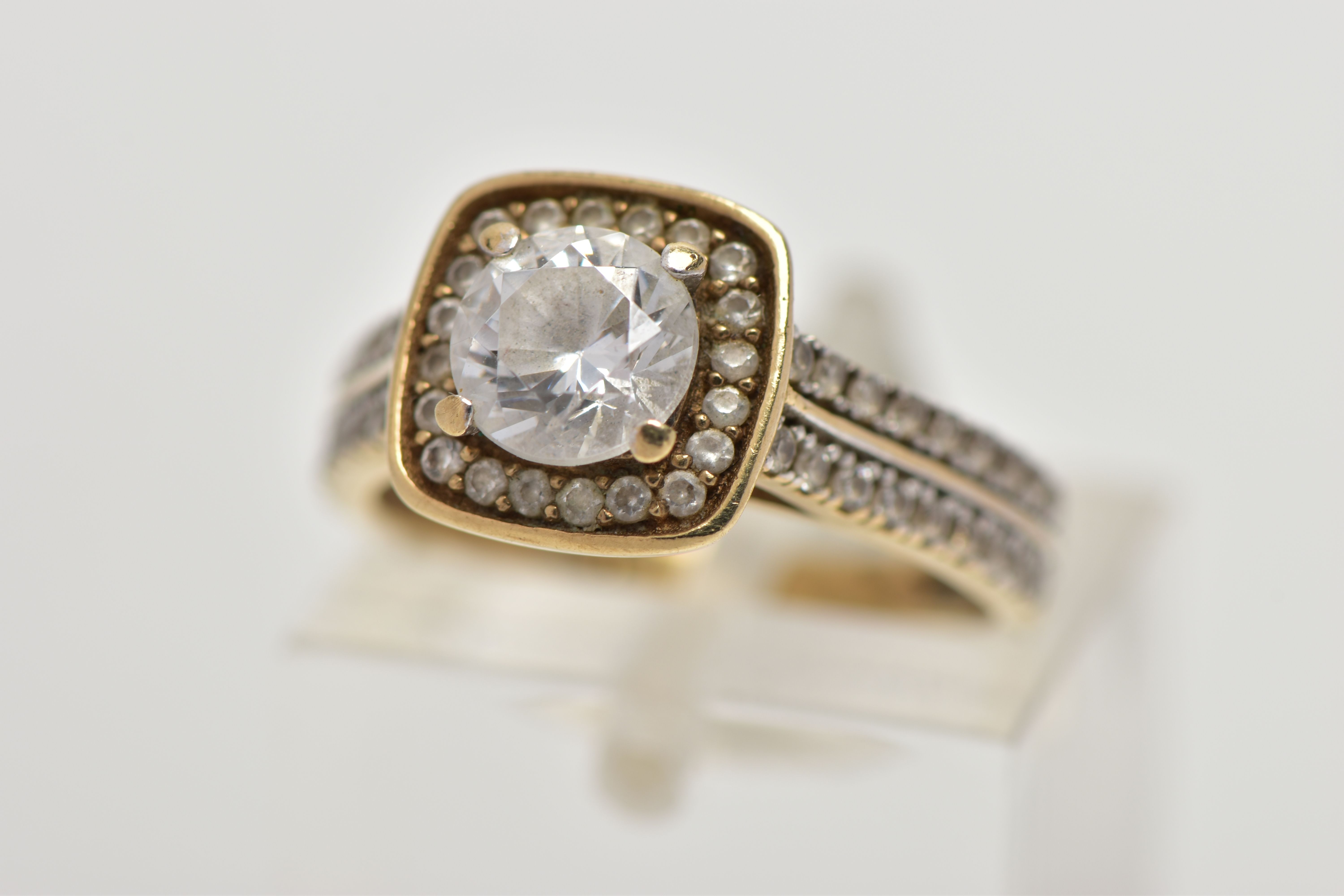 A 9CT GOLD CUBIC ZIRCONIA CLUSTER RING, the circular cluster set with cubic zirconia, AF, hallmarked