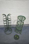 A GREEN PAINTED ALUMINIUM FOUR TIER STAND, along with a steel stand, and a circular trivet (3)