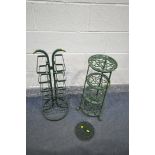 A GREEN PAINTED ALUMINIUM FOUR TIER STAND, along with a steel stand, and a circular trivet (3)