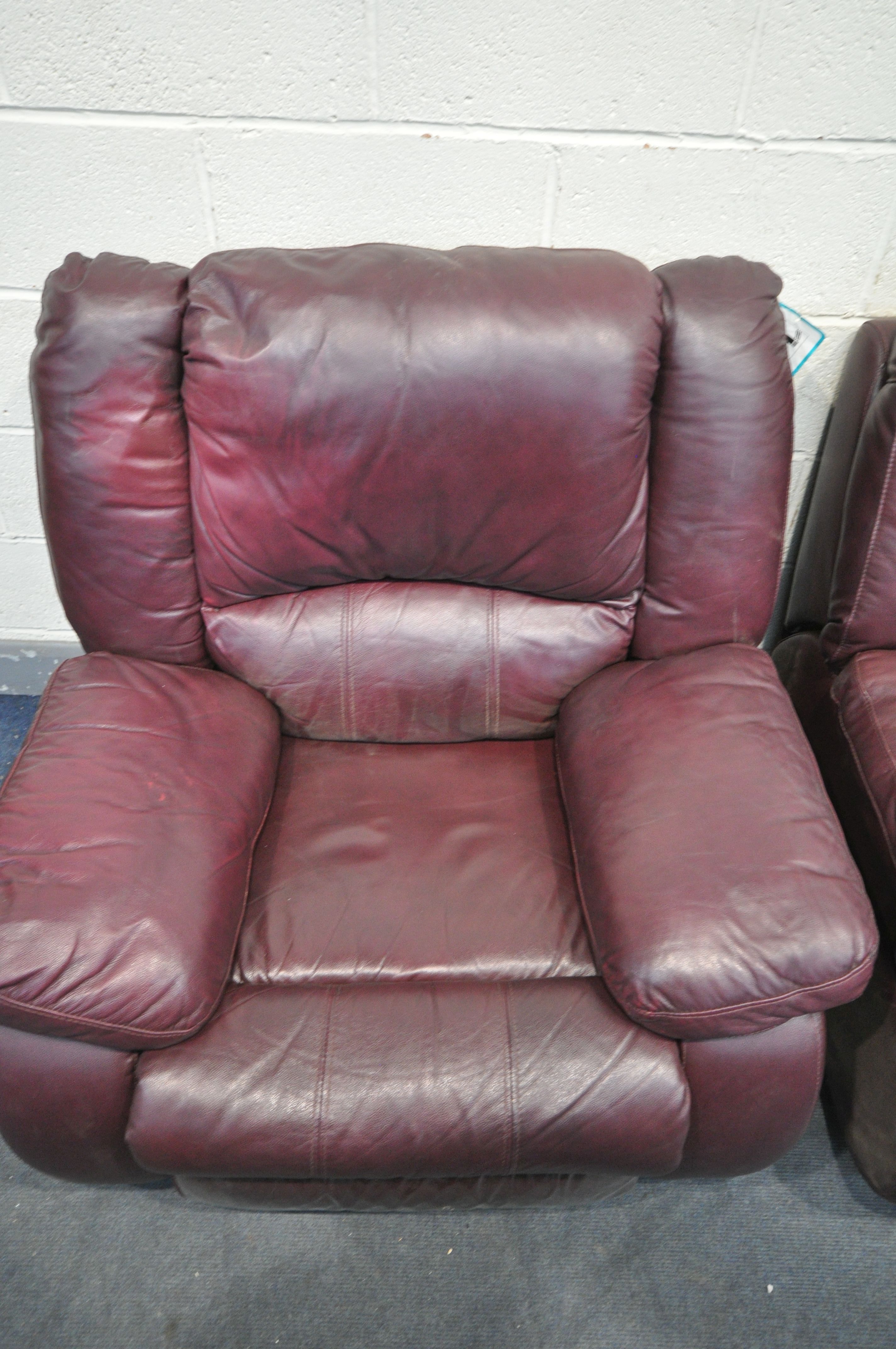 A PLUM COLORED LEATHERETTE THREE SEATER MANUAL RECLINING CHAIR, along with a matching rocking - Image 3 of 3