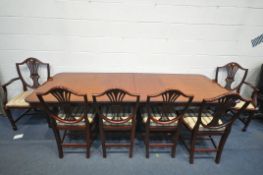 A LARGE RECTANGULAR YEW WOOD EXTENDING DINING TABLE, with two additional leaves, open length 245cm x