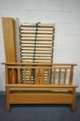 A LIGHT OAK 5FT BED FRAME, with ducal ducaflex slats (condition - some fluid stains)