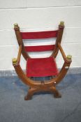 AN OAK FOLDING SAVONAROLA BISHOPS CHAIR, with brass caps, and red velour fabric, width 59cm x