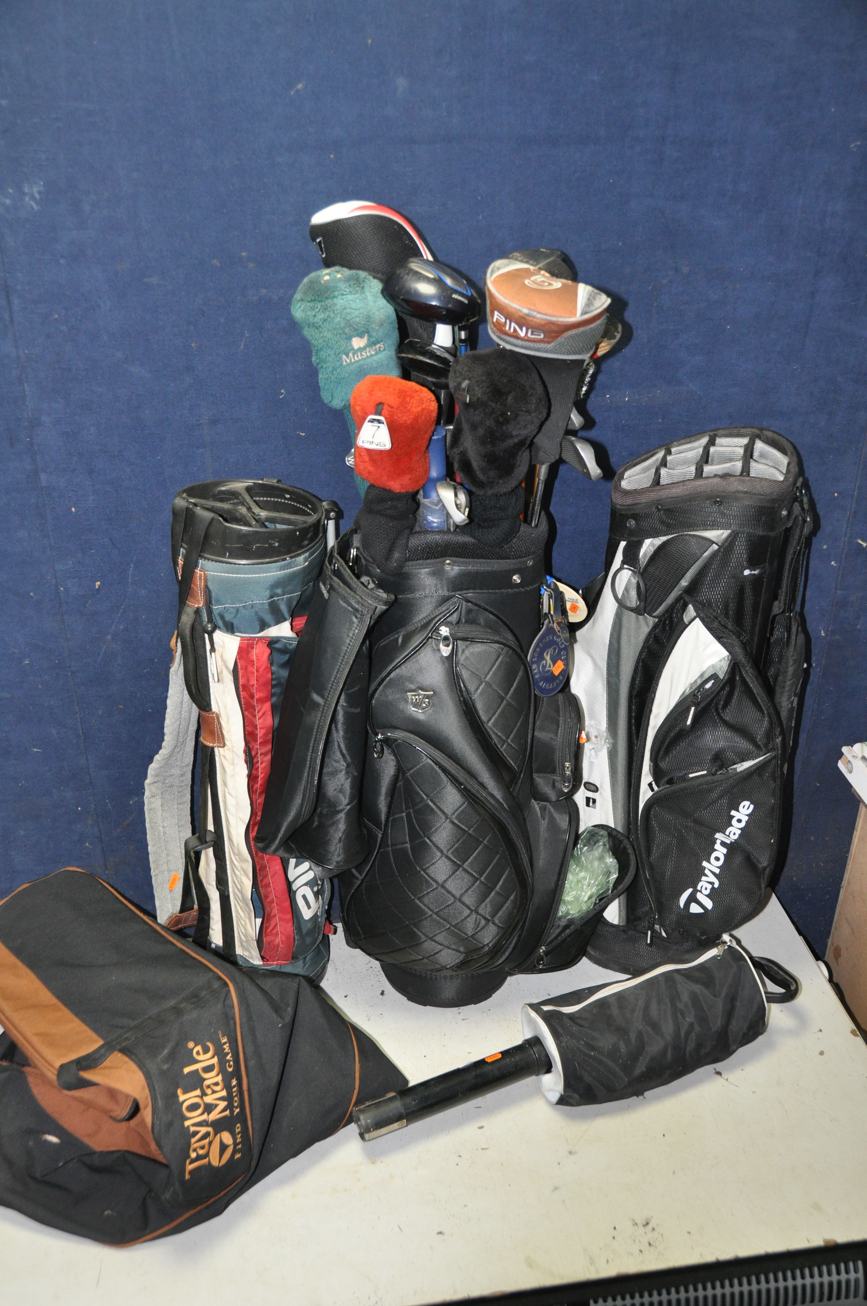 GOLFING EQUIPMENT to include three empty golf bags, a Ping, two Taylor made and a Wilson Staff - Image 2 of 3