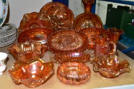 FOURTEEN PIECES OF MARIGOLD CARNIVAL GLASS, to include an oval dish in Pansy pattern length 21cm,