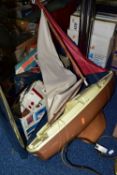 A COLLECTION OF FOUR CHILDRENS SAILING BOATS, comprising Nikko 'Carib-Star' remote control in