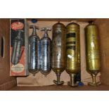 A BOX CONTAINING SIX VINTAGE CHROME, BRASS AND COPPER FIRE EXTINGUISHERS, including a boxed Junior