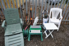 A GREEN PLASTIC GARDEN SUN LOUNGER, two white plastic garden armchairs, three folding tables,