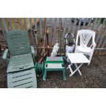 A GREEN PLASTIC GARDEN SUN LOUNGER, two white plastic garden armchairs, three folding tables,
