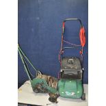 A QUALCAST ECLIPSE320 lawnmower with no power cable (PAT fail due to join in cable) along with a