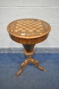 A LATE VICTORIAN WALNUT AND MARQUETRY INLAID TRUMPET SEWING TABLE, with a chess playing surface top,