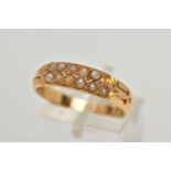 A LATE VICTORIAN 18CT GOLD SEED PEARL RING, designed with two rows of split seed pearls (one is
