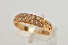 A LATE VICTORIAN 18CT GOLD SEED PEARL RING, designed with two rows of split seed pearls (one is