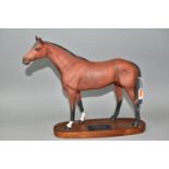 A BESWICK RACEHORSE FIGURE, no 1564, brown matt finish, on an oval wooden plinth labelled '