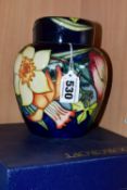 A BOXED MOORCROFT POTTERY EMMA BOSSONS GOLDEN JUBILEE 2002 GINGER JAR AND COVER, bears printed,