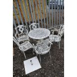 A WHITE PAINTED ALUMINIUM CIRCULAR GARDEN TABLE, diameter 73cm x height 68cm and five chairs (