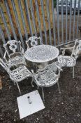 A WHITE PAINTED ALUMINIUM CIRCULAR GARDEN TABLE, diameter 73cm x height 68cm and five chairs (