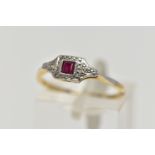 A YELLOW METAL RUBY AND DIAMOND RING, art deco style ring set with a square cut ruby, flanked with