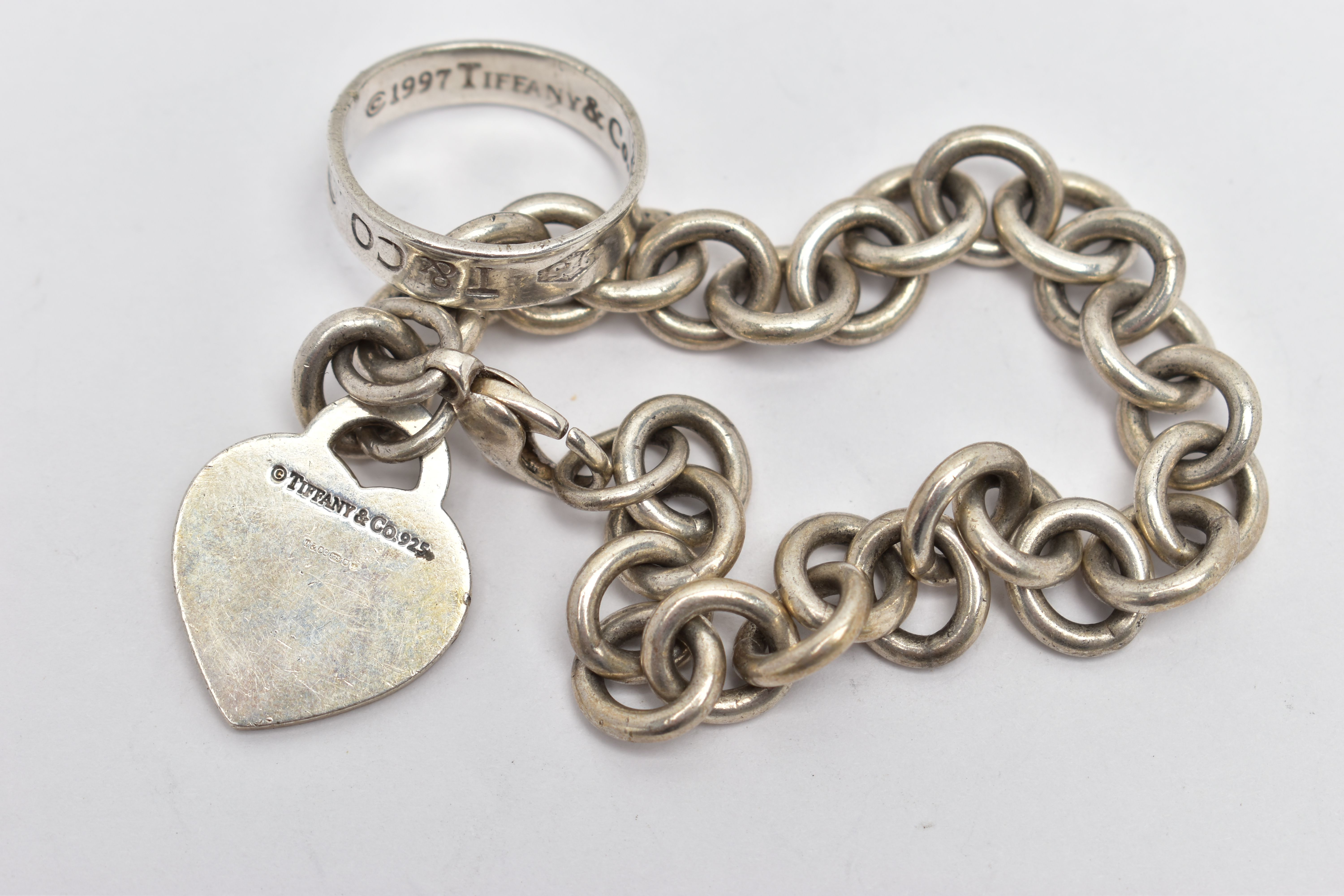 A SILVER 'RETURN TO TIFFANY & CO.' BRACELET AND WHITE METAL T&CO. '1837' RING, the curb link - Image 2 of 2