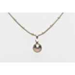 A TAHITIAN PEARL AND DIAMOND PENDANT NECKLACE, the pendant fitted with a single Tahitian black pearl