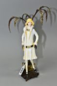 AN ALBANY BONE CHINA AND BRONZE 'MONTMARTRE' FIGURINE, the figurine in 1920s dress, standing