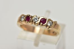 A 9CT GOLD HALF ETERNITY RING, designed with a row of three colourless cubic zirconia interspaced