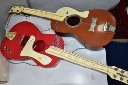 A 1960S SELCOL ELVIS PRESLEY PLASTIC GUITAR, brown front with silver Elvis Presley signature logo,