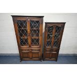 AN OLD CHARM LEAD GLAZED TWO DOOR BOOKCASE, bottom with two linenfold doors, width 100cm x depth