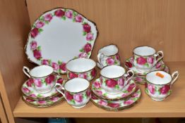 A ROYAL ALBERT 'OLD ENGLISH ROSE' PATTERN TWENTY PIECE TEA SET, comprising a bread and butter plate,