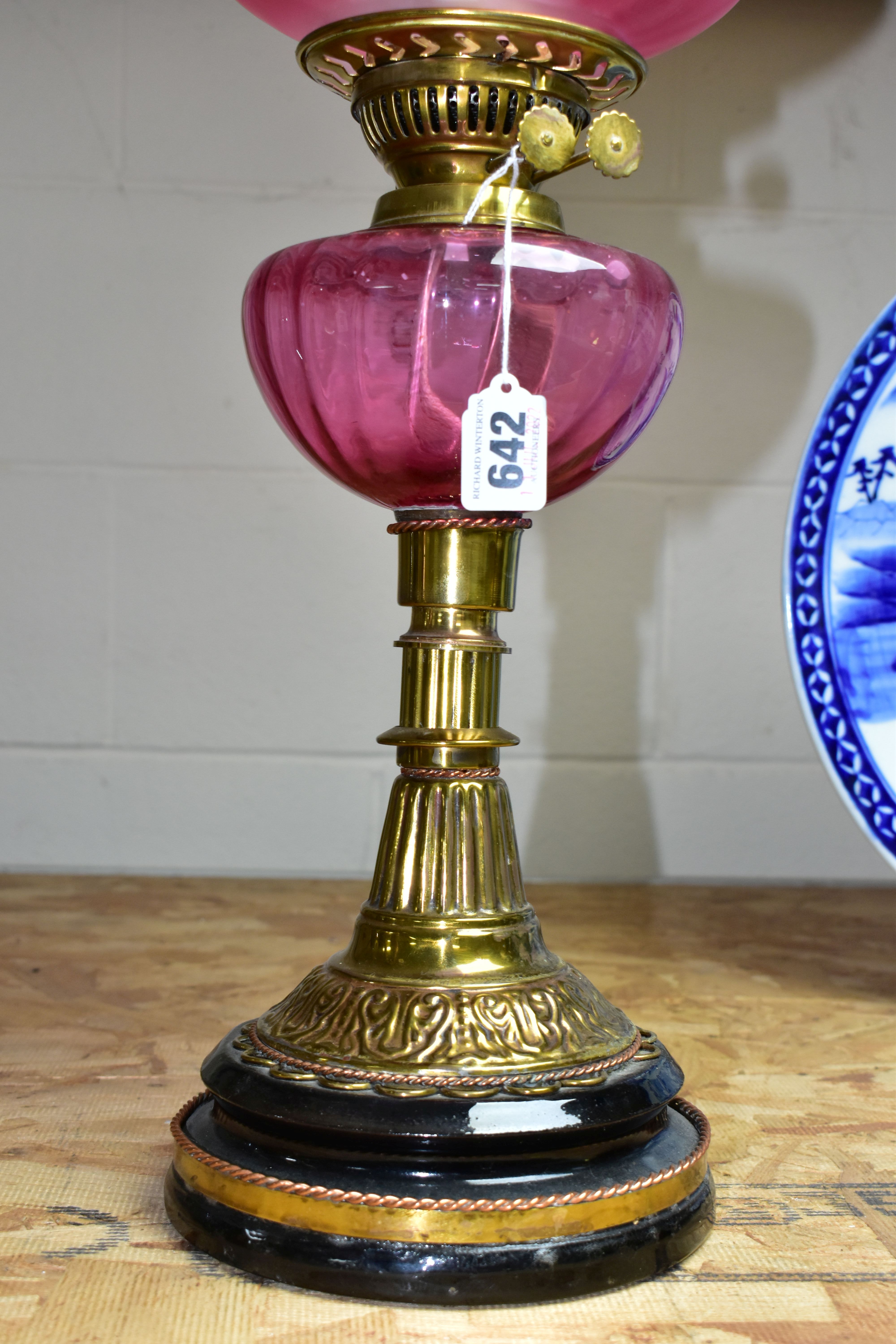 A LATE VICTORIAN BRASS BASED OIL LAMP, the domed acid etched clear and opaque cranberry shade - Image 3 of 4