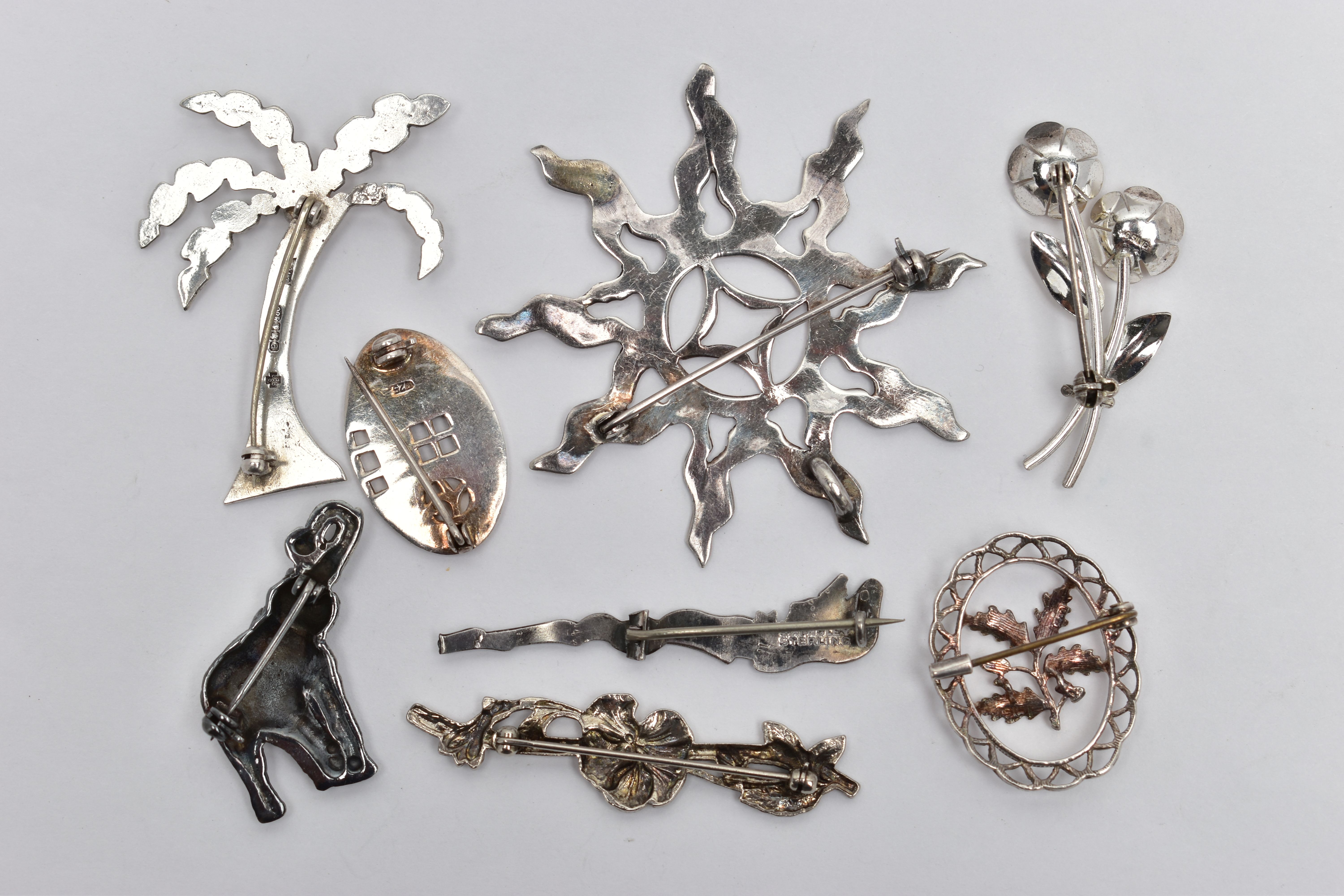 A SELECTION OF SILVER AND WHITE METAL BROOCHES, to include a silver palm tree, hallmarked - Image 2 of 2