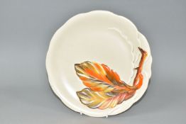 A CLARICE CLIFF/WILKINSON LTD AUTUMN LEAVES PLATE, the wavy edged plate having moulded and painted