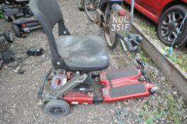 A LUGGIE FOLDING DISABILITY SCOOTER, with two batteries and a charger (condition:-spares and