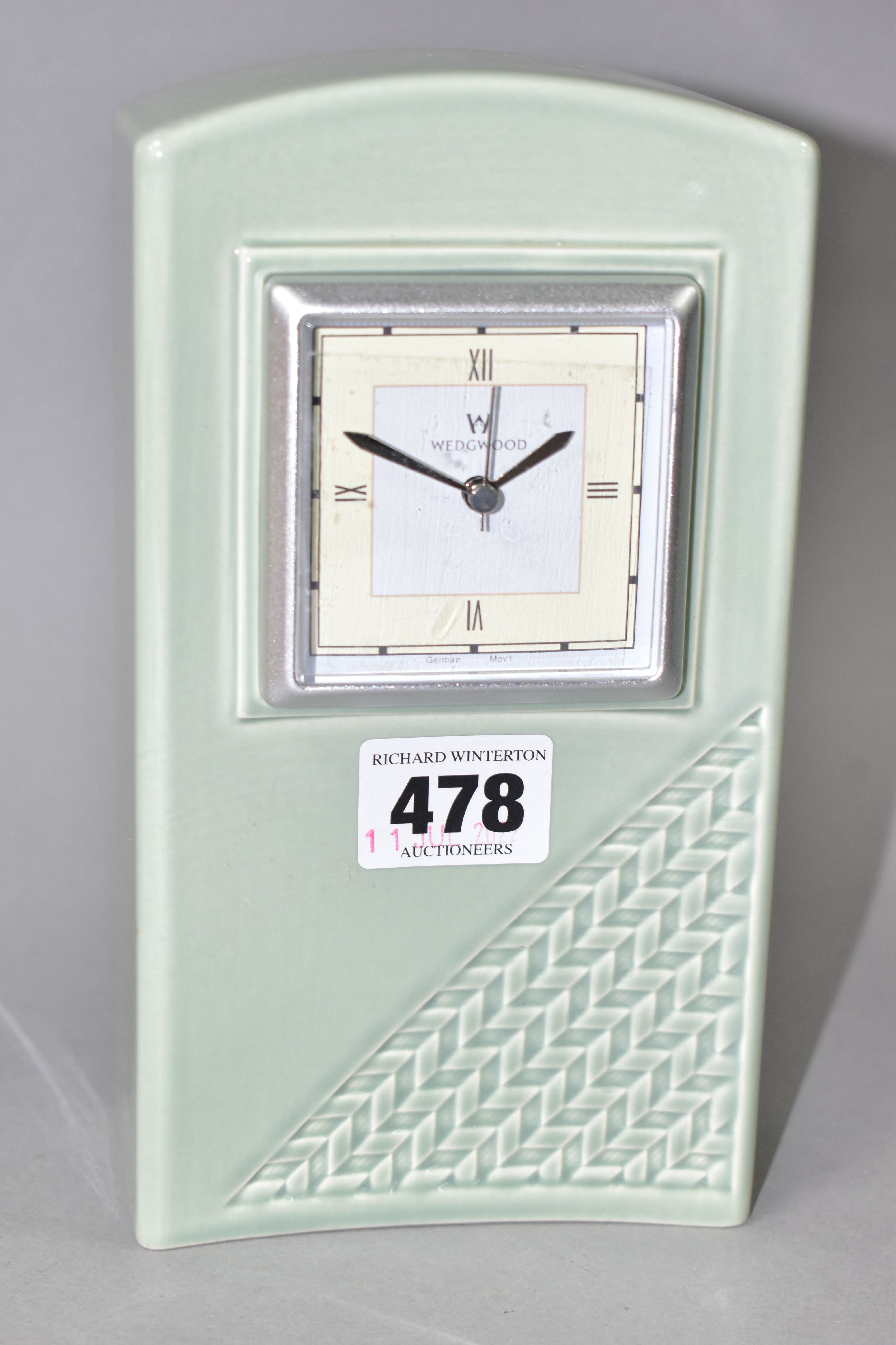 A WEDGWOOD INTERIORS MILLENIUM MANTEL CLOCK, in pale green, contemporary style with chevron