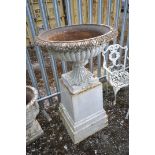 A LARGE CAST IRON CAMPAGNA GARDEN URN, of a shallow form, on a separate plinth support, diameter