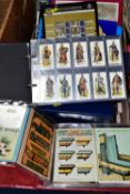 A QUANTITY OF CIGARETTE EPHEMERA, comprising three albums of Cigarette Card reprints, an album of