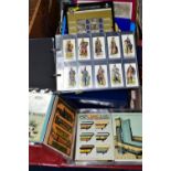 A QUANTITY OF CIGARETTE EPHEMERA, comprising three albums of Cigarette Card reprints, an album of