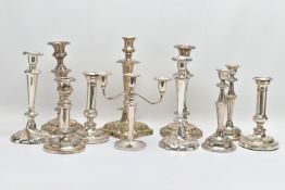 A BOX OF ASSORTED WHITE METAL CANDLE STICKS, eleven candle sticks of various styles, all with