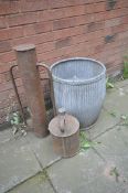 A GALVANISED DOLLY TUB, along with a metal post rammer and a metal can (3)