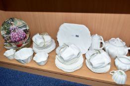 A FORTY FIVE PIECE SHELLEY PLAIN WHITE DAINTY SHAPE TEA SET, comprising a teapot, a coffee pot (