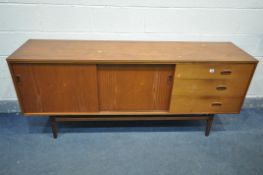 A MID CENTURY AUSTINSUITE TEAK SIDEBOARD, with two sliding doors and three drawers, top drawer