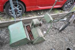 AN ATCO PETROL CYLINDER LAWNMOWER, with grass box