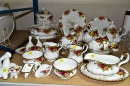 A QUANTITY OF ROYAL ALBERT 'OLD COUNTRY ROSES' CUPS, SAUCERS, TEAPOTS, DINNER PLATES ETC, comprising